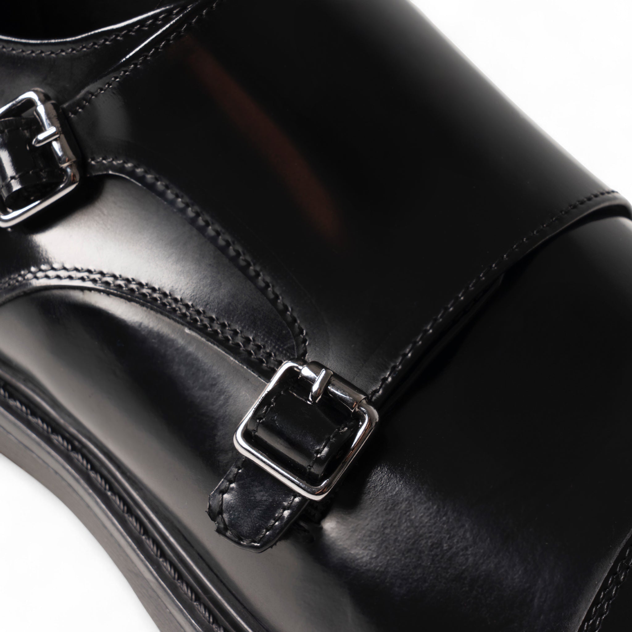 Double monk in pelle nera con puntale