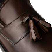 Mocassino con nappine in pelle spazzolata marrone