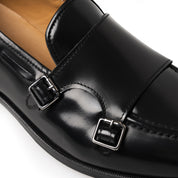 Loafer double monk in pelle spazzolata nera