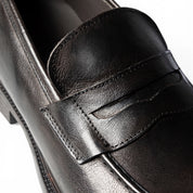 Mocassino penny loafer in pelle testa di moro
